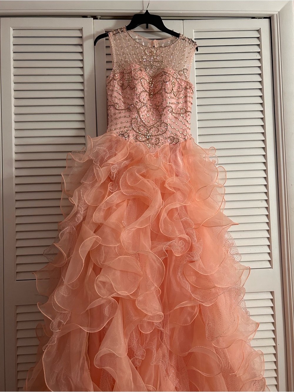 Sleeveless Peach Ruffled Prom Dress with Beaded Bodice